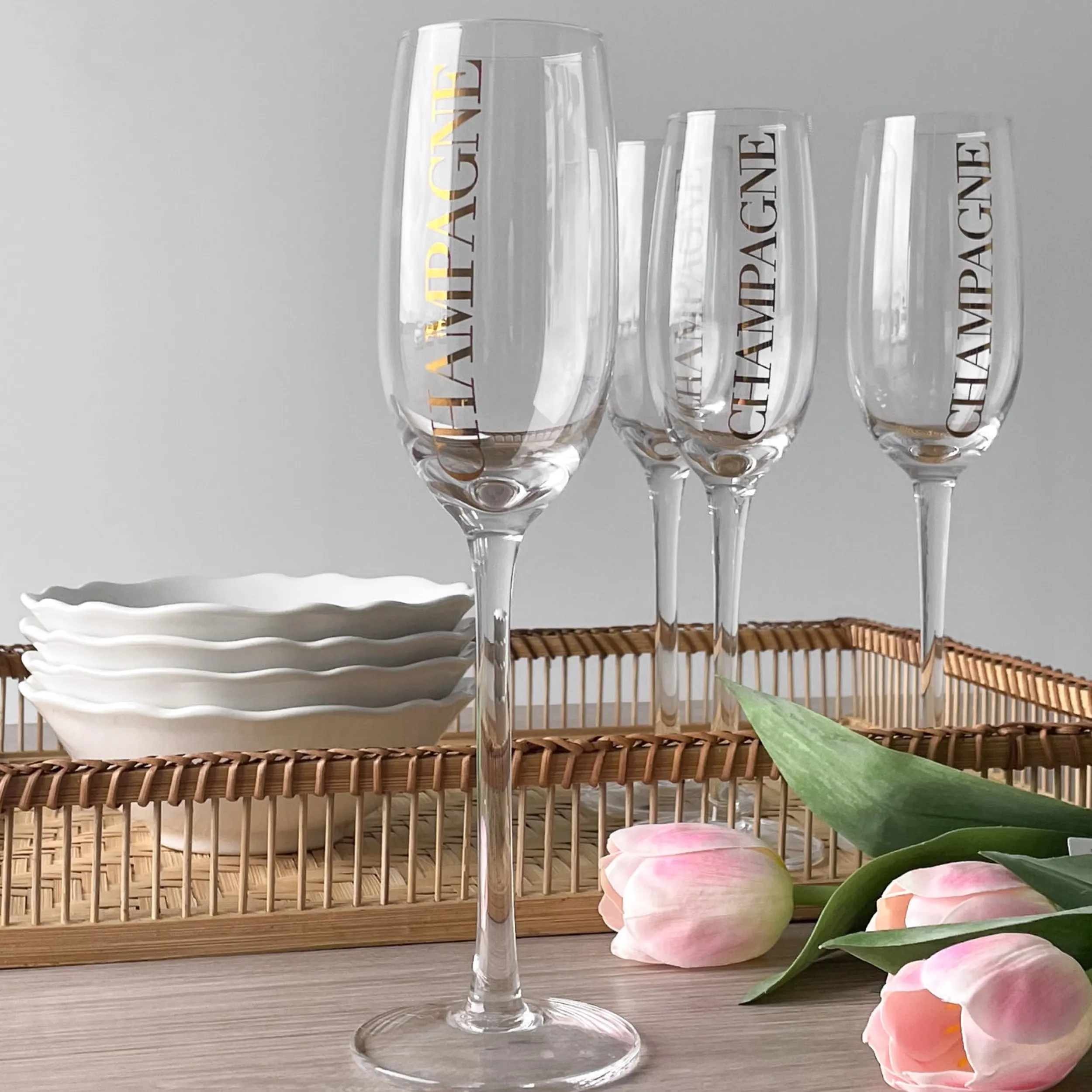 Hot Champagneglass, transparent/gull Borddekking
